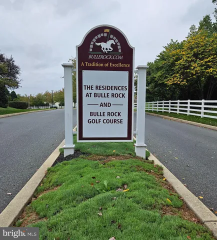 a sign on the side of the road