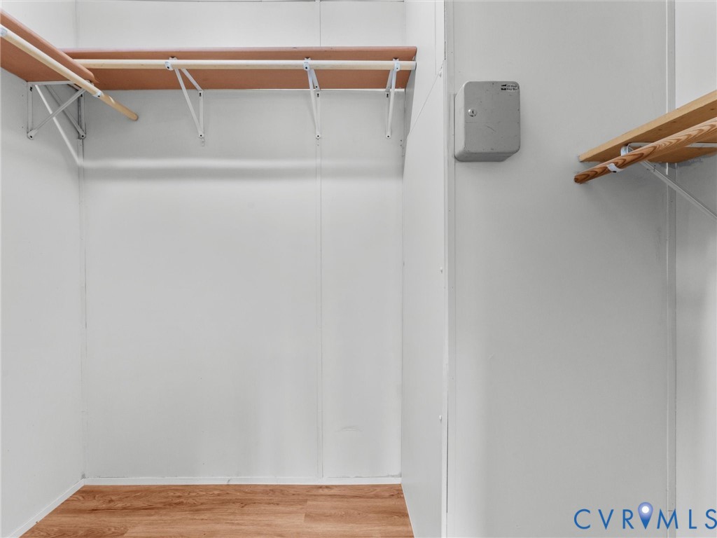 4772 Carsley Road Waverly, VA 23890 - Photo 19 of 38 Spacious closet featuring light wood-style floorin