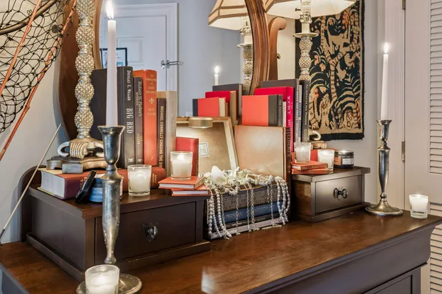 a view of a dining room with furniture and a window