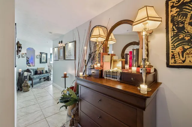 a dining room with furniture window and outside view