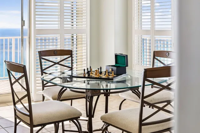 a spacious bathroom with a granite countertop sink a mirror and a