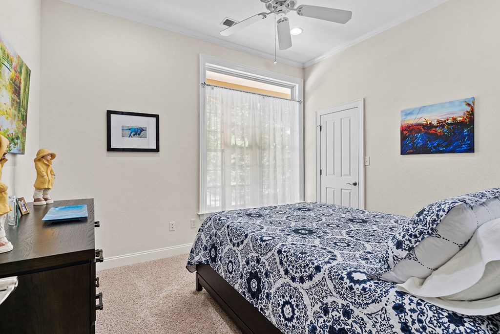 337 Compass Point Ninety Six, SC 29666 - Photo 19 of 43 a bedroom with a bed and a lamp on dresser