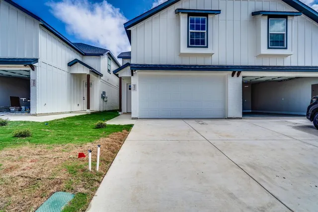a house view with a backyard space