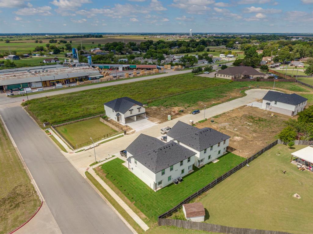 920 Cooksey Court, Unit B Grandview, TX 76050 - Photo 6 of 27 an aerial view of a house with a ocean view