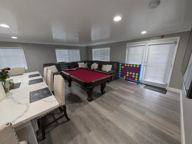 a living room with furniture a wooden floor and furniture