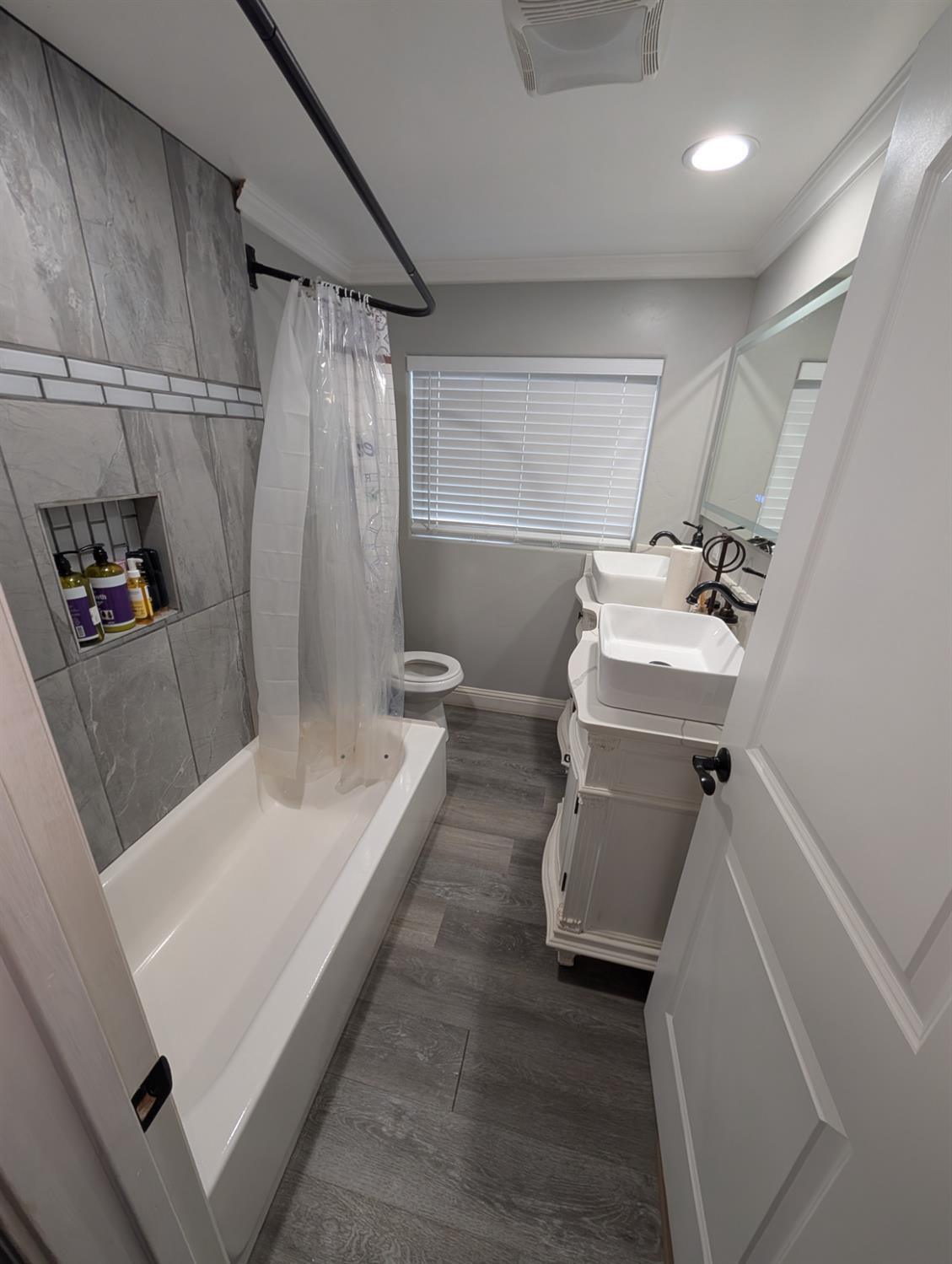 4142 Albers Road Oakdale, CA 95361 - Photo 12 of 20 a bathroom with a sink a toilet and shower