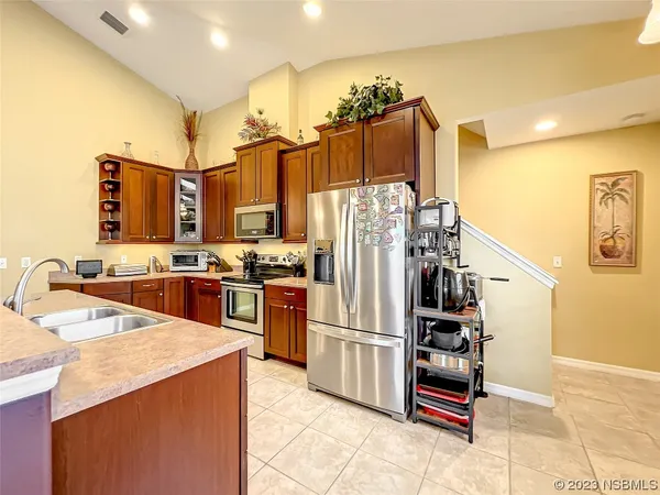 a bedroom with bed and window