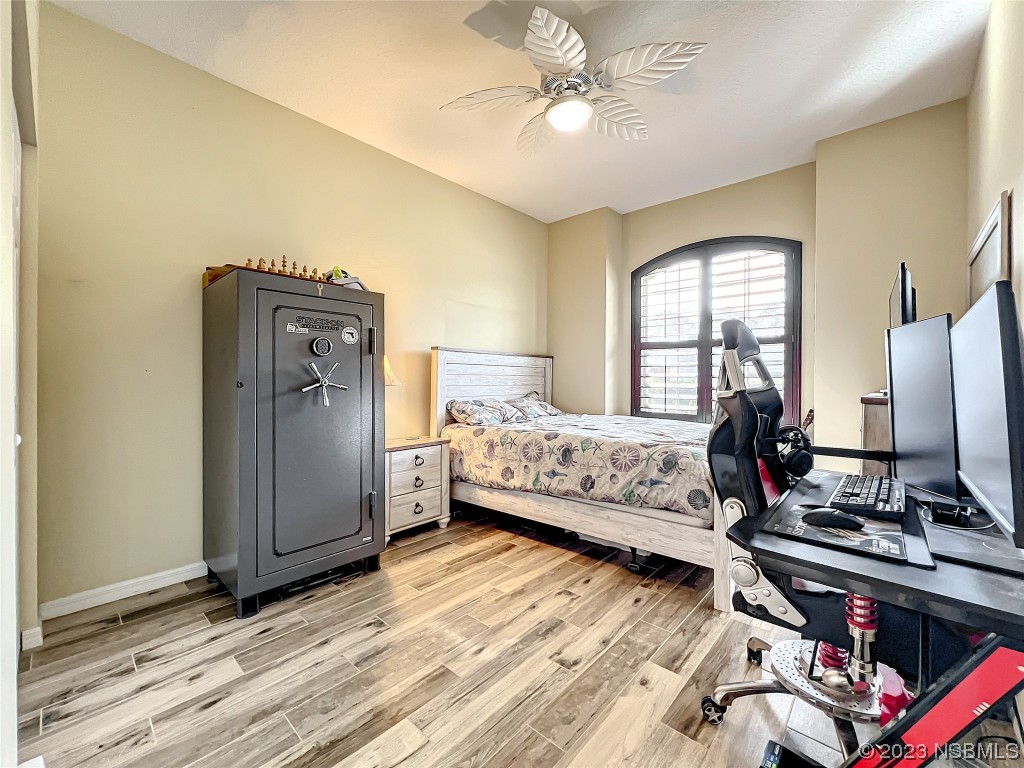 407 Northstar Lane Edgewater, FL 32141 - Photo 20 of 47 a bedroom with bed and window