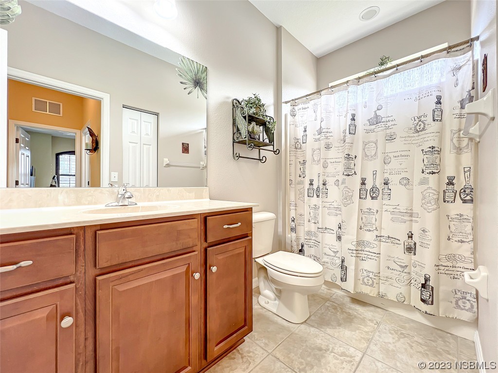 407 Northstar Lane Edgewater, FL 32141 - Photo 22 of 47 a bathroom with a sink toilet and shower