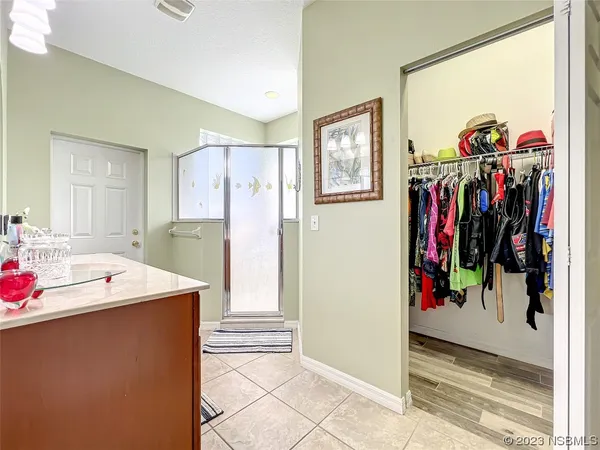 a bathroom with a bathtub and shower