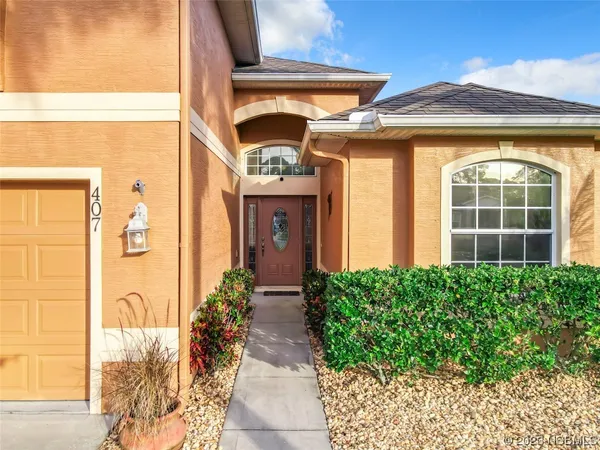 a view of a entryway door front of house