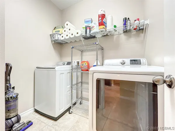 a view of a swimming pool with a lounge chairs