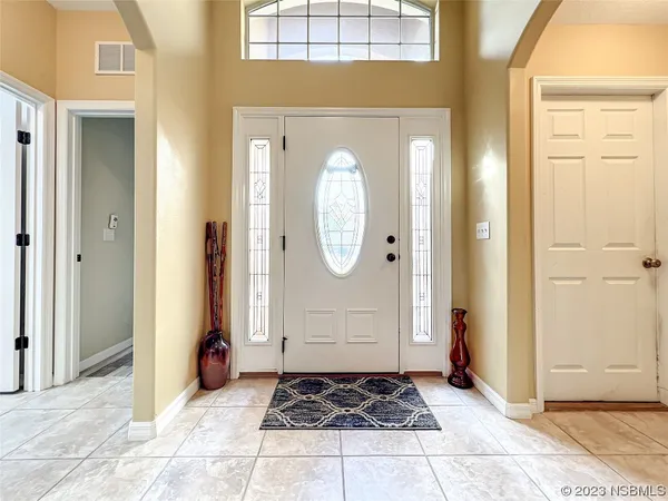 a view of living room filled with furniture and rug