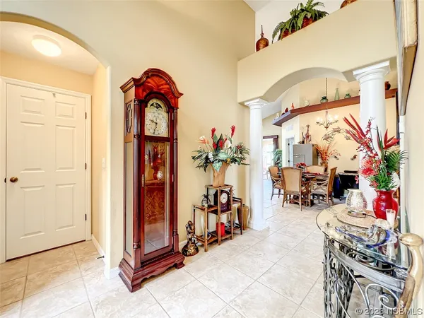 a view of a livingroom with furniture and a window