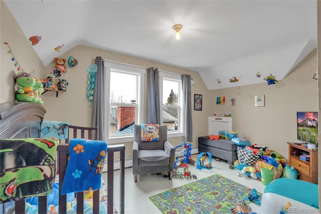 a bathroom with a sink vanity mirror and tub