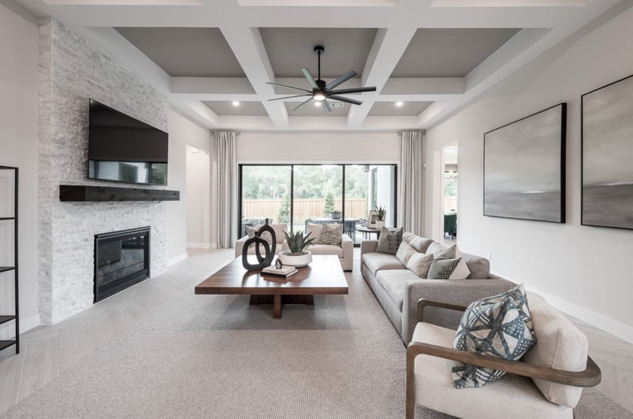 28005 Shining Trails Court Spring, TX 77386 - Photo 4 of 7 a living room with furniture a fireplace and a flat screen tv