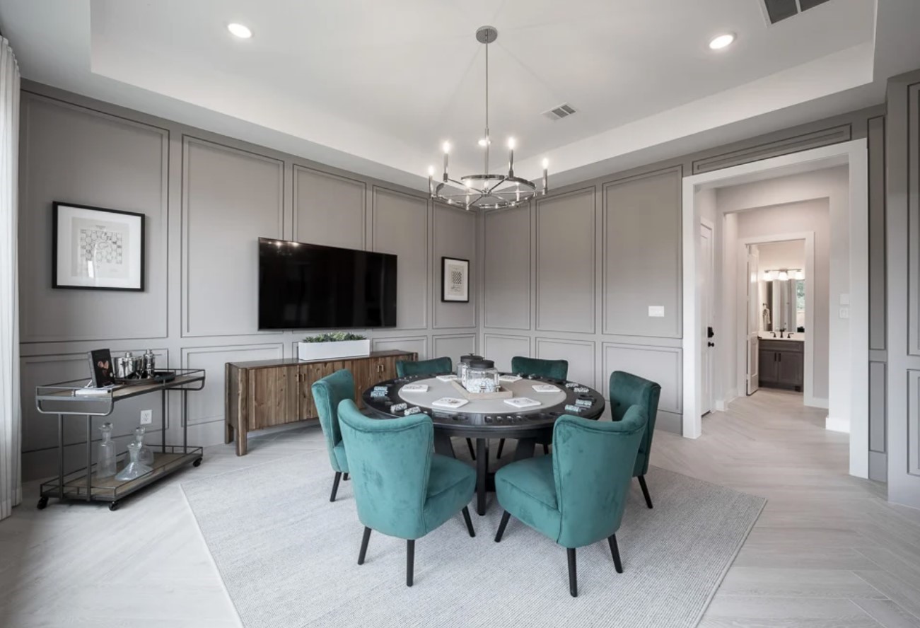 28005 Shining Trails Court Spring, TX 77386 - Photo 5 of 7 a view of a livingroom with furniture and a flat screen tv