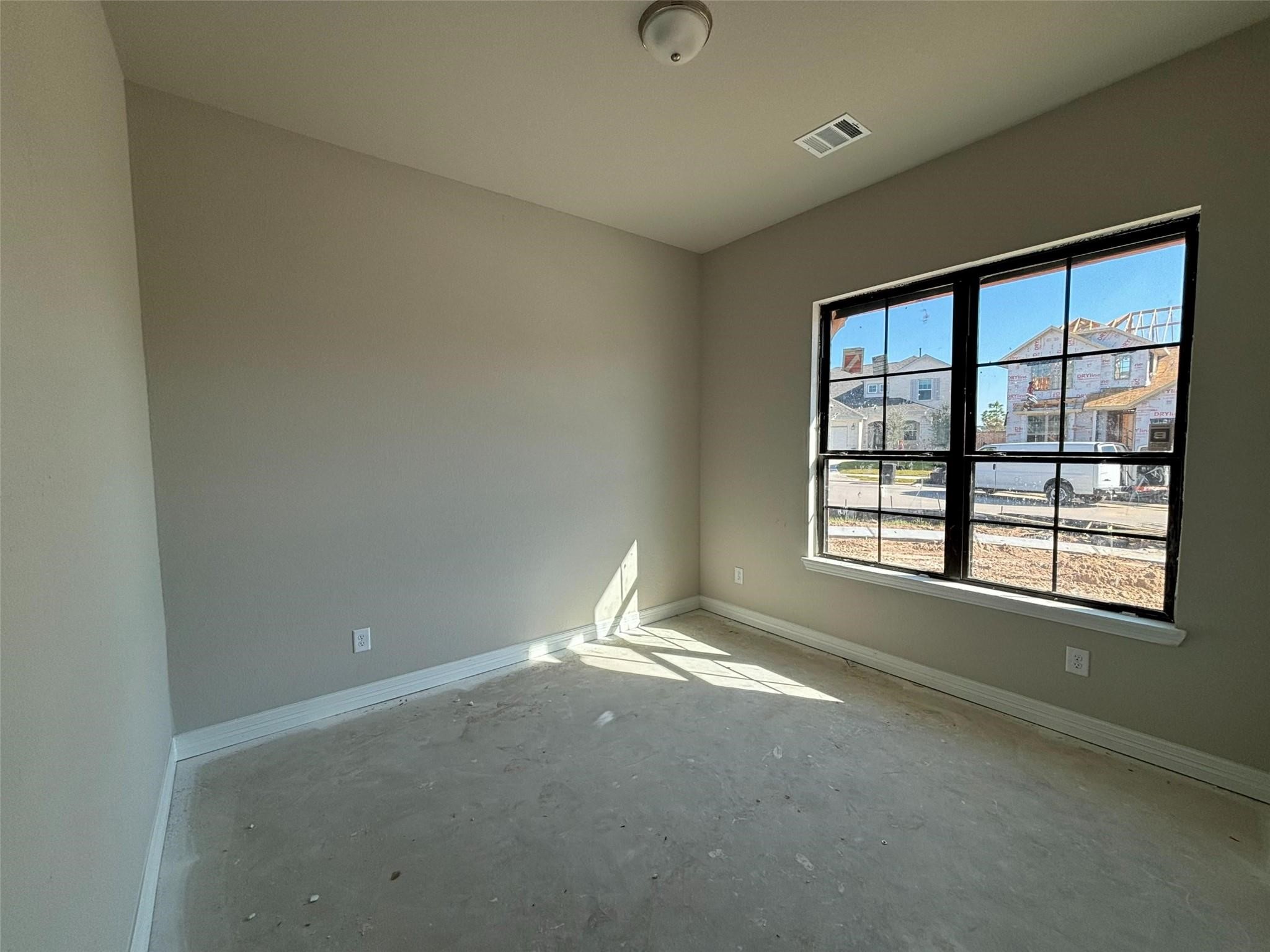 28005 Shining Trails Court Spring, TX 77386 - Photo 7 of 7 an empty room with a empty space and windows