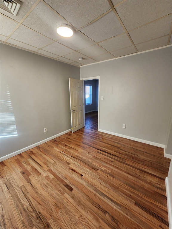 920 Pine Street, Unit 3W Fall River, MA 02720 - Photo 5 of 9 a view of empty room with wooden floor and fan