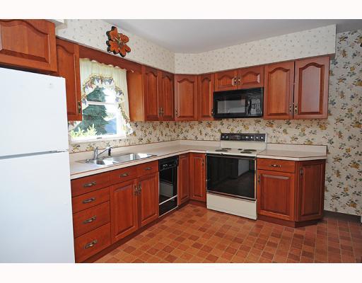 27 Greenview Drive McKees Rocks, PA 15136 - Photo 8 of 13 Exterior Front. Custom Cherry cabinets, double sink with disposal, stove,