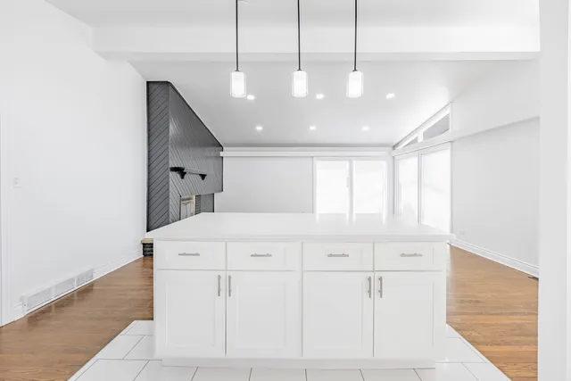 a view of cabinets and window