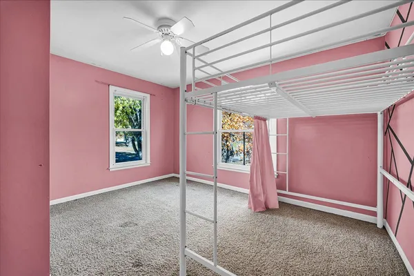 a view of a room with a large window