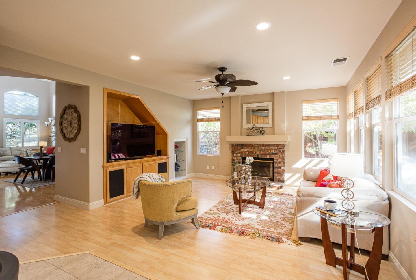 52 Foster Drive San Ramon, CA 94583 - Photo 14 of 50 a living room with fireplace furniture and a flat screen tv