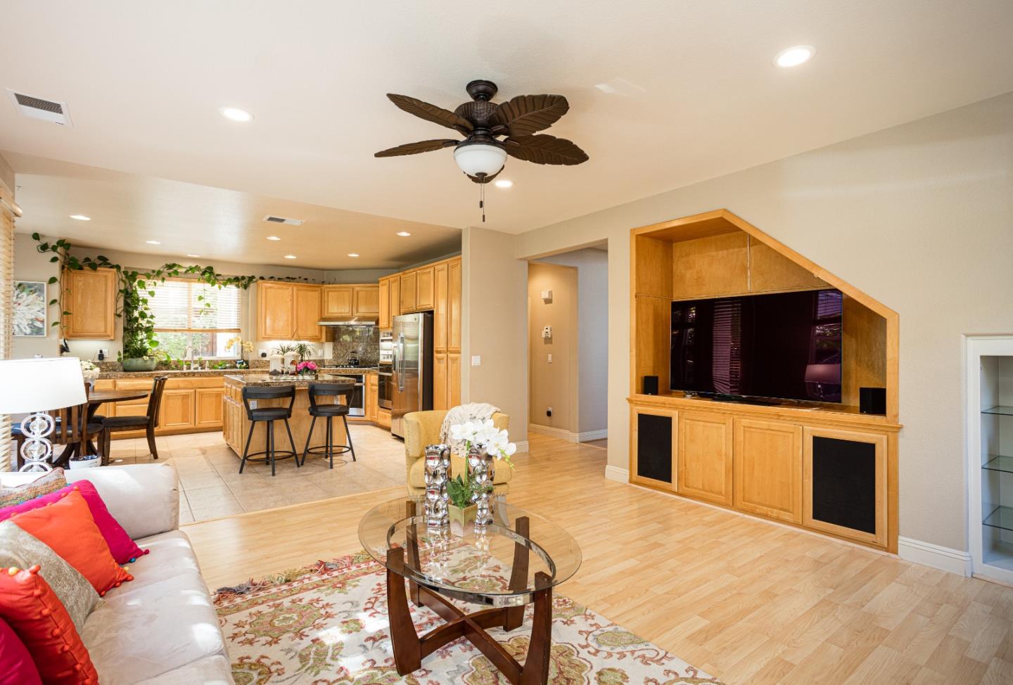 52 Foster Drive San Ramon, CA 94583 - Photo 15 of 50 a living room with furniture a flat screen tv and kitchen view
