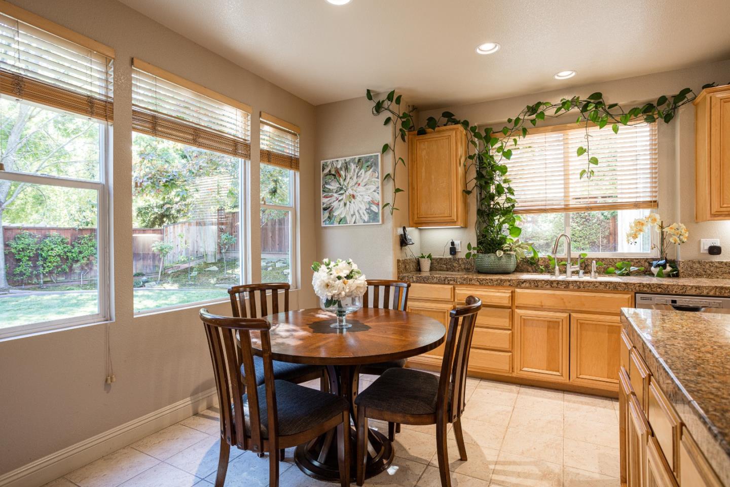 52 Foster Drive San Ramon, CA 94583 - Photo 19 of 50 a dining room with furniture a chandelier and wooden floor