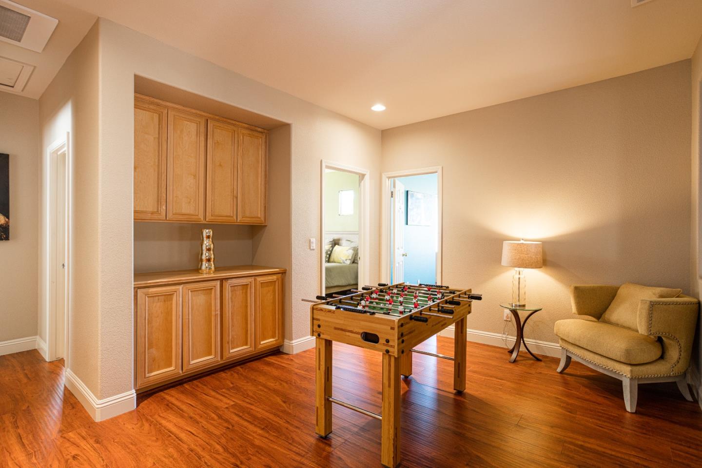 52 Foster Drive San Ramon, CA 94583 - Photo 28 of 50 a walk in closet room with wooden floor and furniture