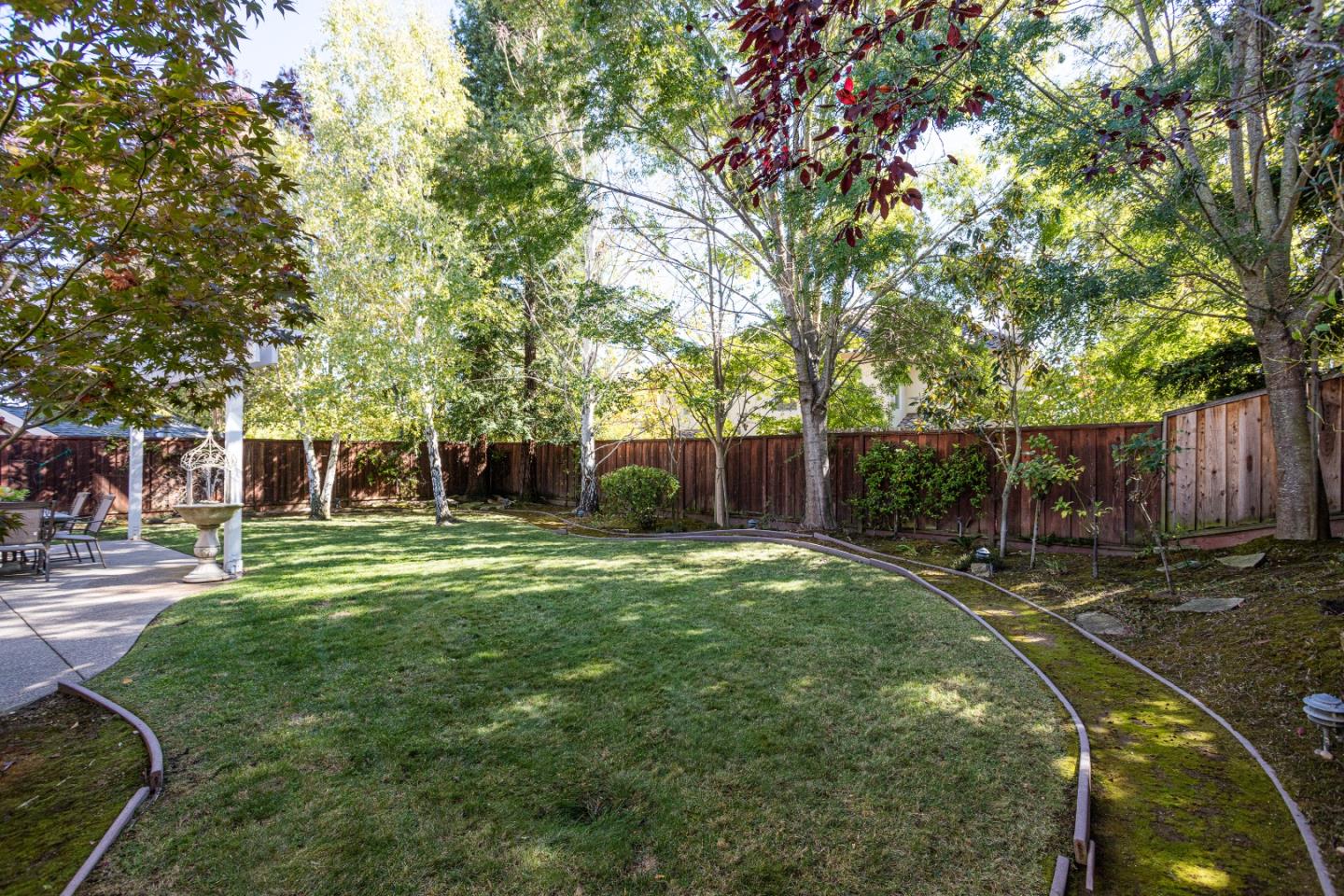 52 Foster Drive San Ramon, CA 94583 - Photo 37 of 50 a backyard of a house with table and chairs