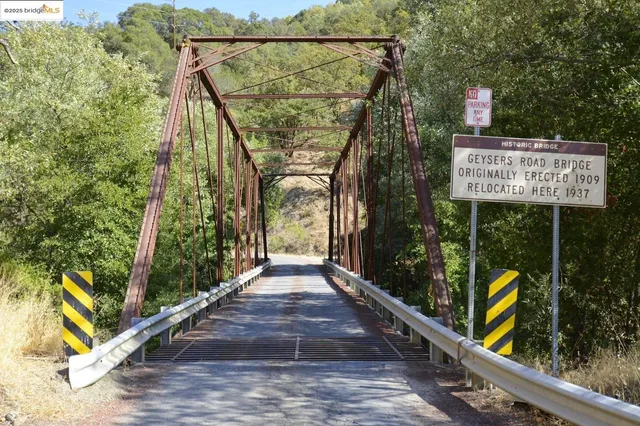 a view of a street with sitting area