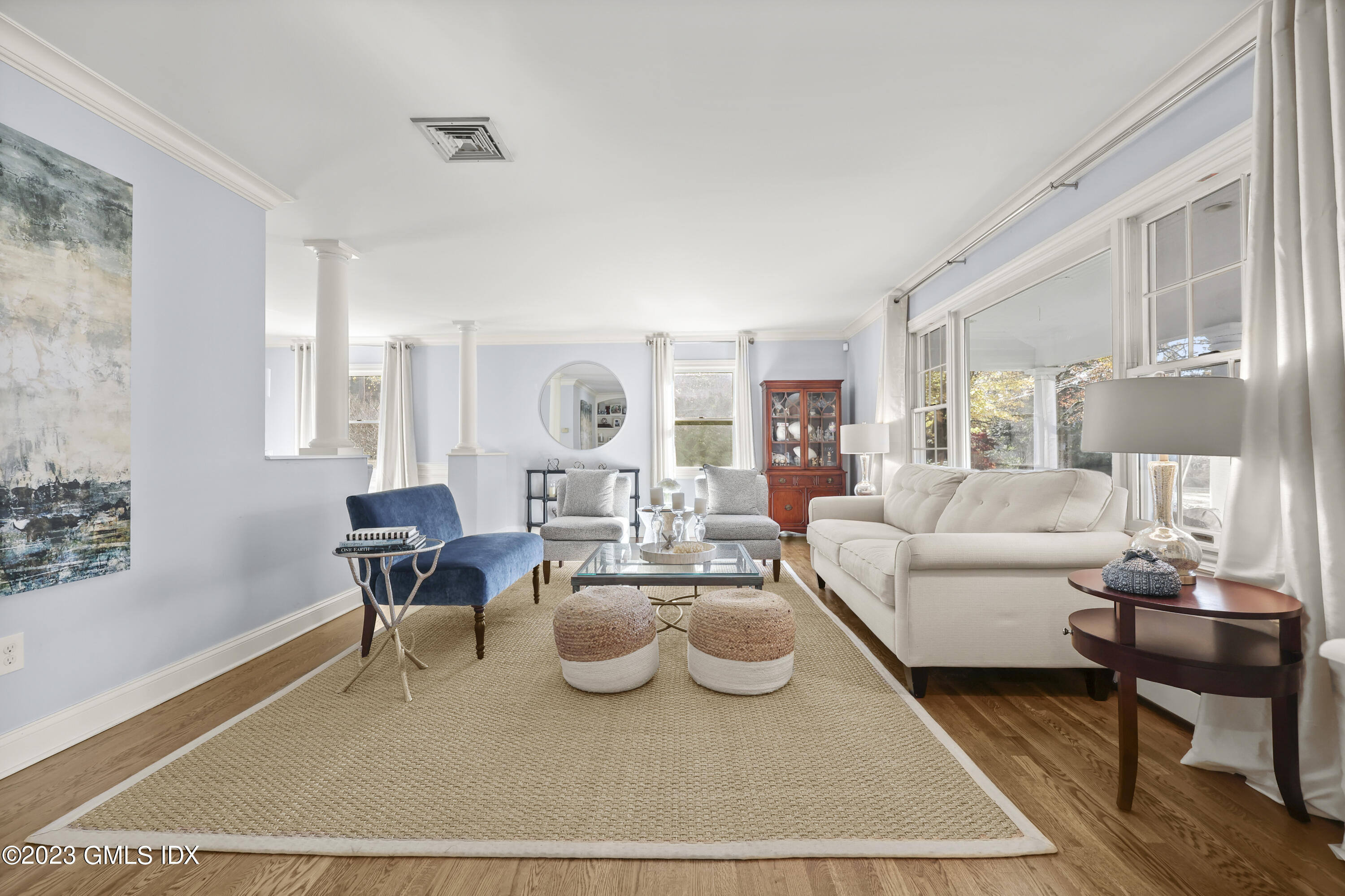14 Rainbow Drive Riverside, CT 06878 - Photo 2 of 29 a living room with furniture a rug and a lamp