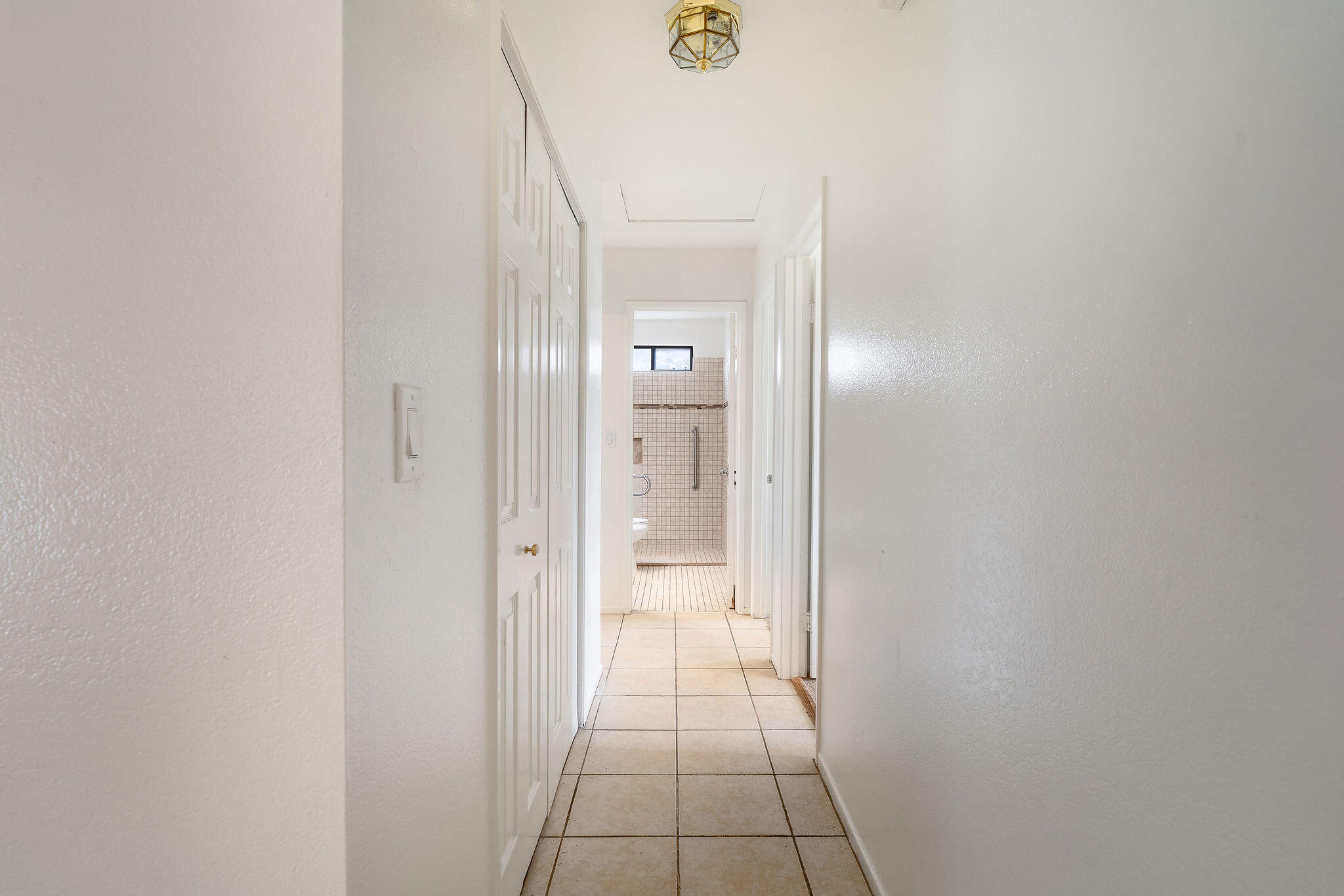 68750 Fortuna Road Cathedral City, CA 92234 - Photo 19 of 42 a view of a bathroom from a hallway
