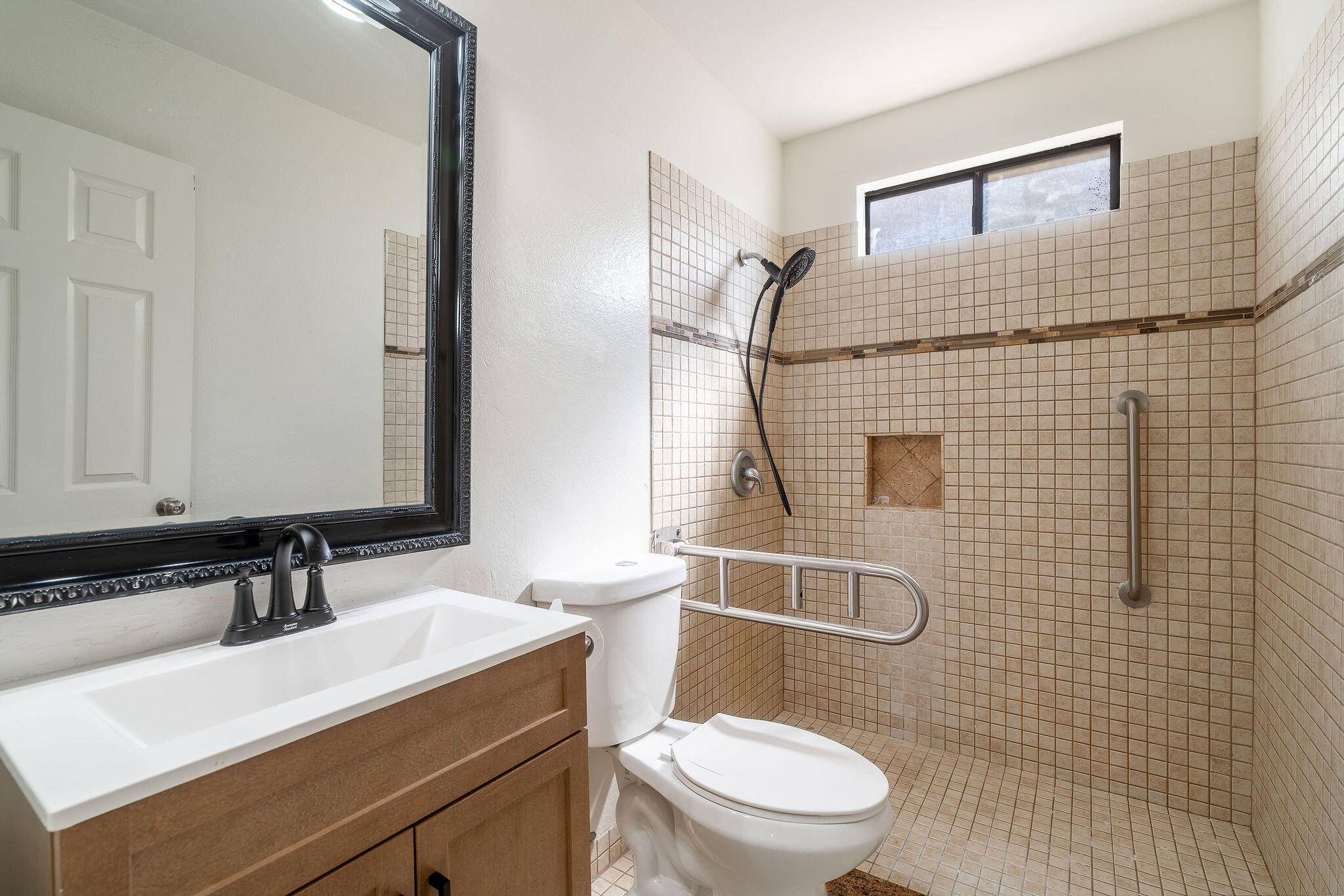 68750 Fortuna Road Cathedral City, CA 92234 - Photo 23 of 42 a bathroom with a sink a toilet and shower