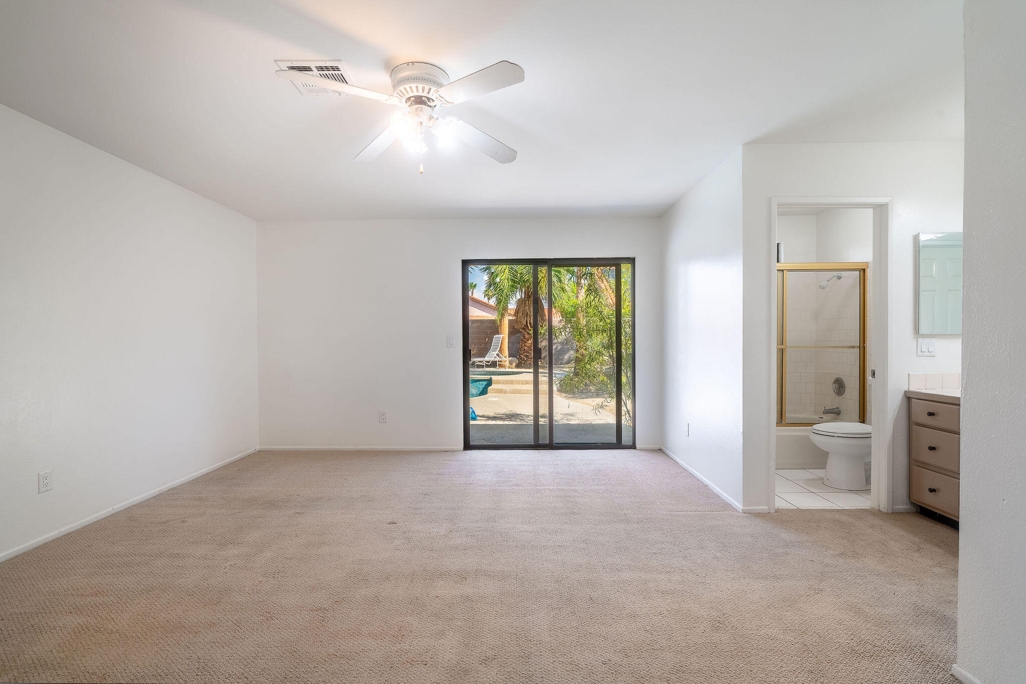 68750 Fortuna Road Cathedral City, CA 92234 - Photo 24 of 42 a view of an empty room with a window and a bathroom
