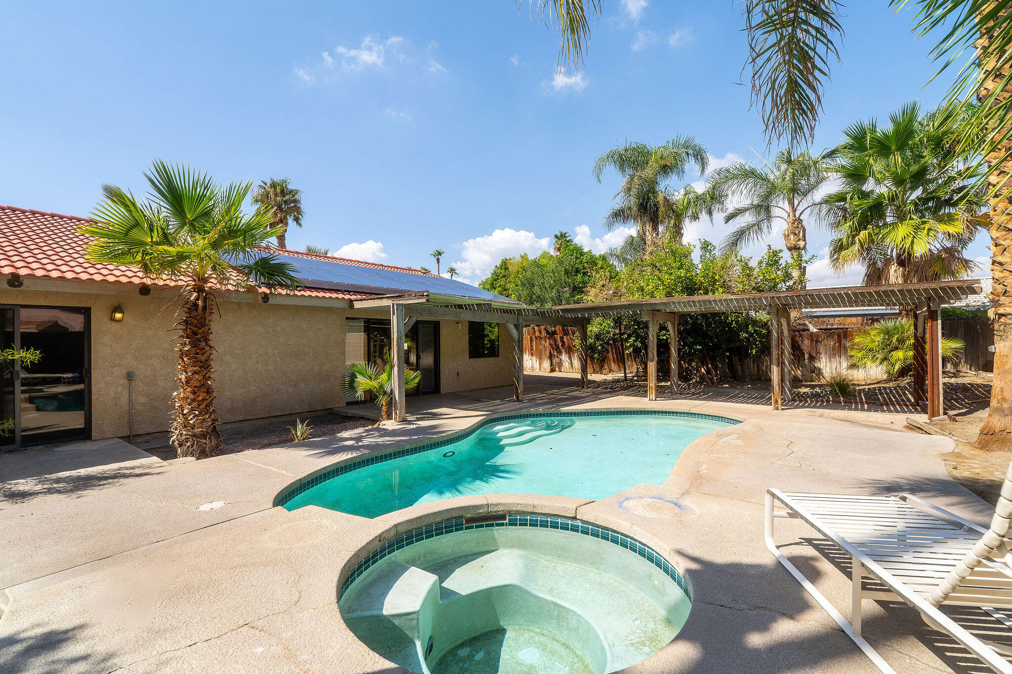 68750 Fortuna Road Cathedral City, CA 92234 - Photo 35 of 42 a view of a swimming pool with a patio