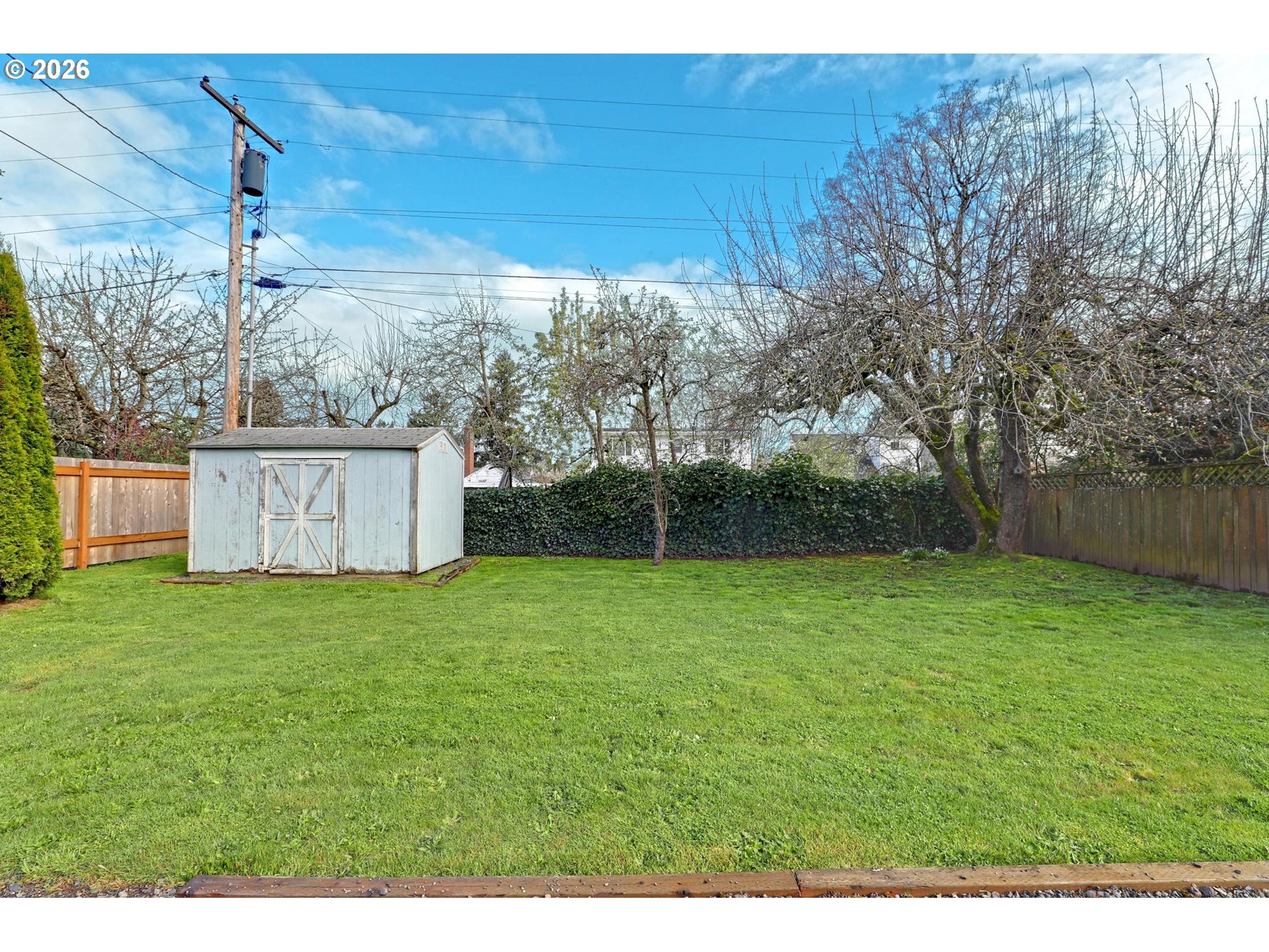 8915 Southeast Market Street Portland, OR 97216 - Photo 17 of 26 a view of a back yard