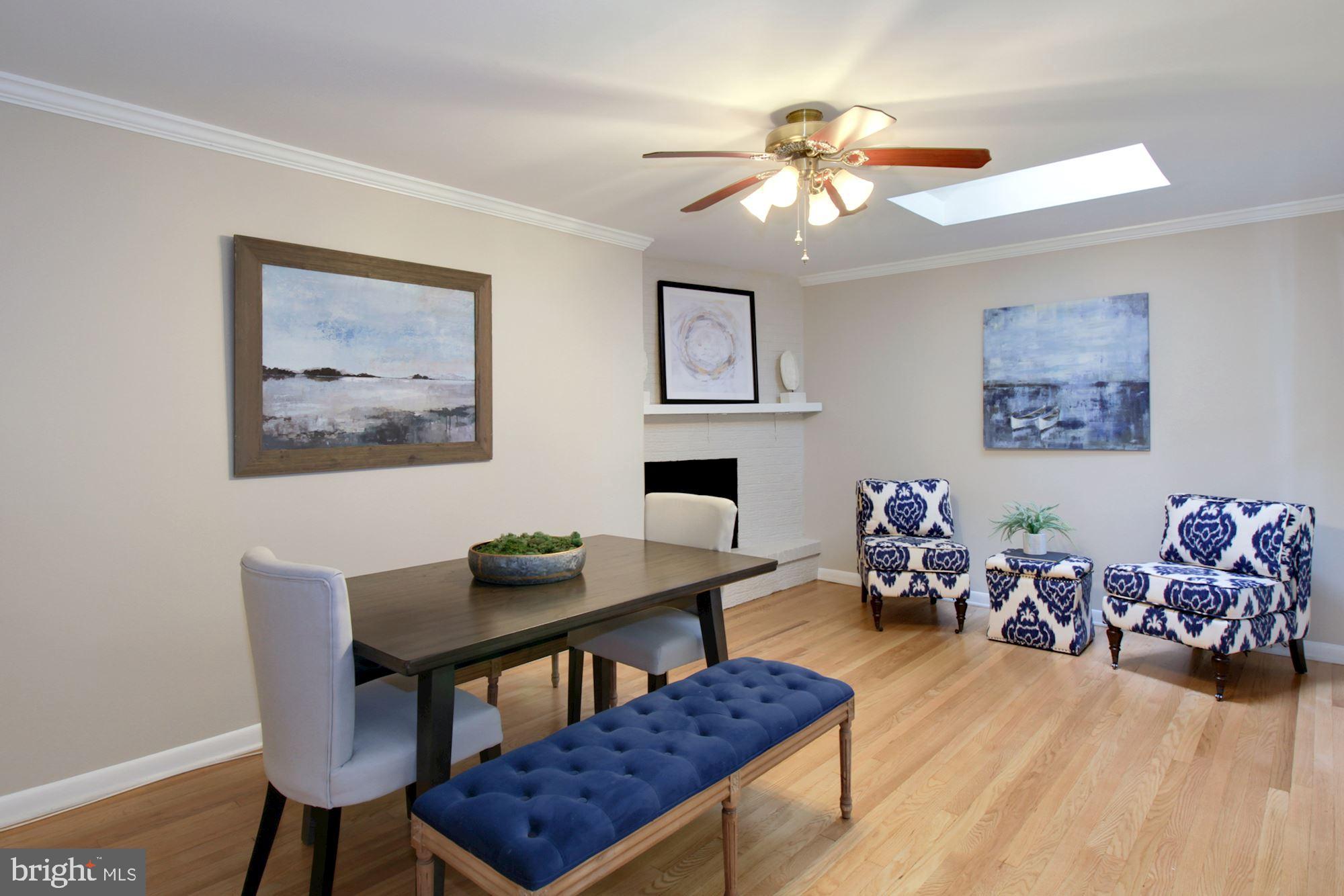 2625 Ogleton Road Annapolis, MD 21403 - Photo 18 of 57 Dining Room with skylights and fireplace.