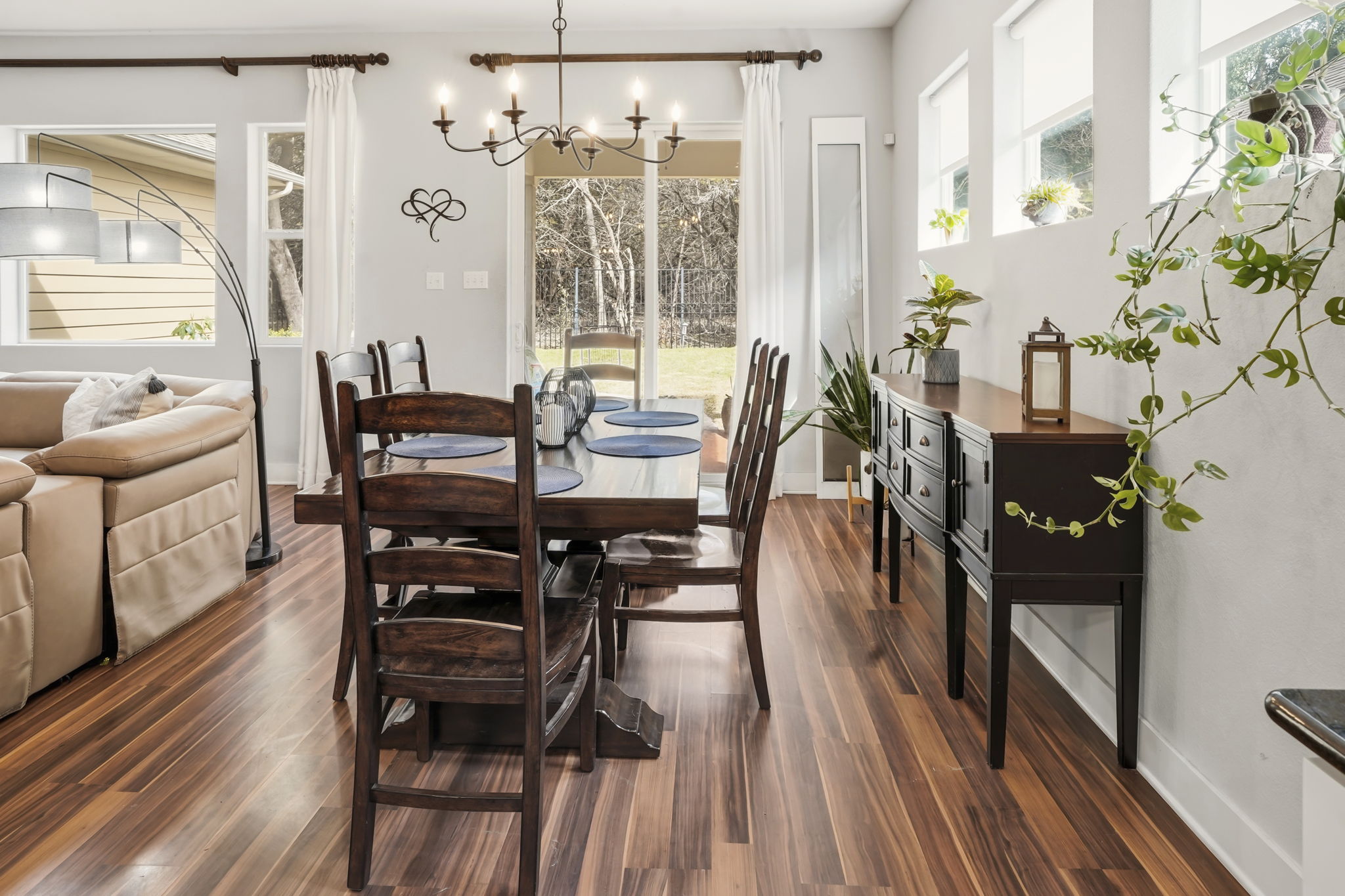 504 Bowery Trail Austin, TX 78753 - Photo 17 of 38 Dining room with hanging lights and dark wood finished floors