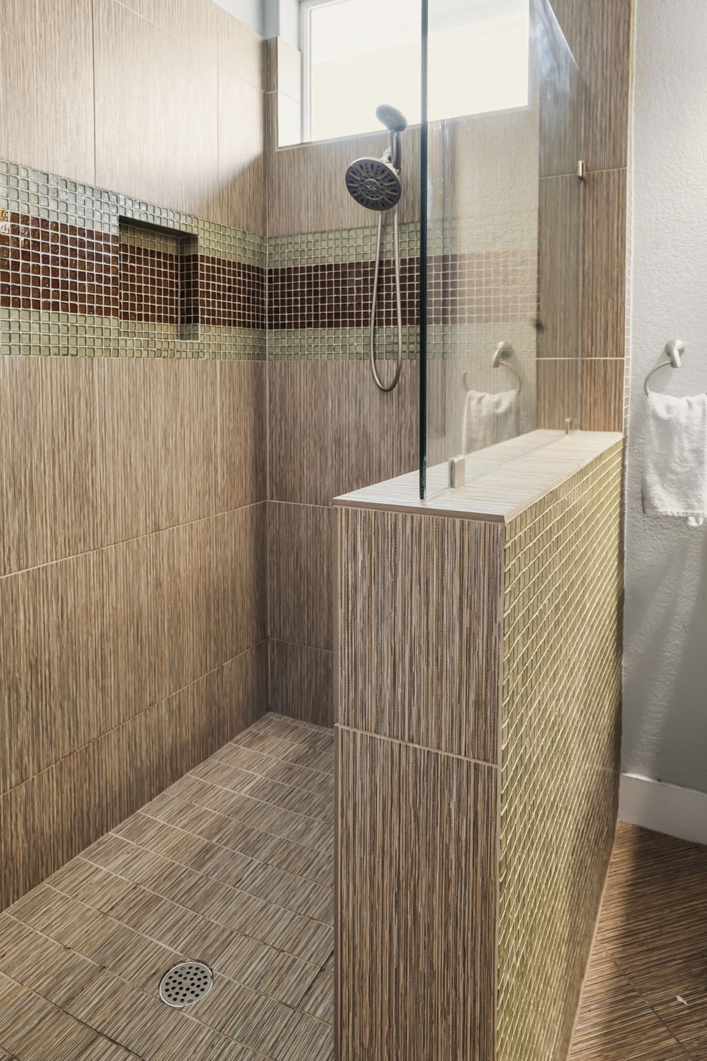 504 Bowery Trail Austin, TX 78753 - Photo 22 of 38 Bathroom featuring a walk in shower and healthy amount of natural light