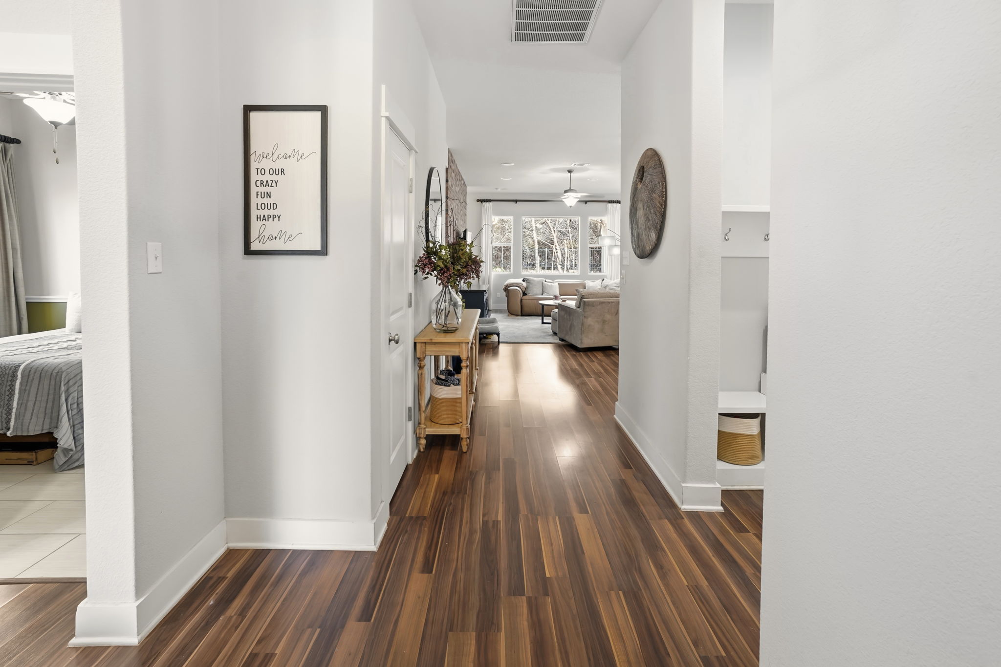 504 Bowery Trail Austin, TX 78753 - Photo 5 of 38 Hall featuring dark wood-style flooring and baseboards
