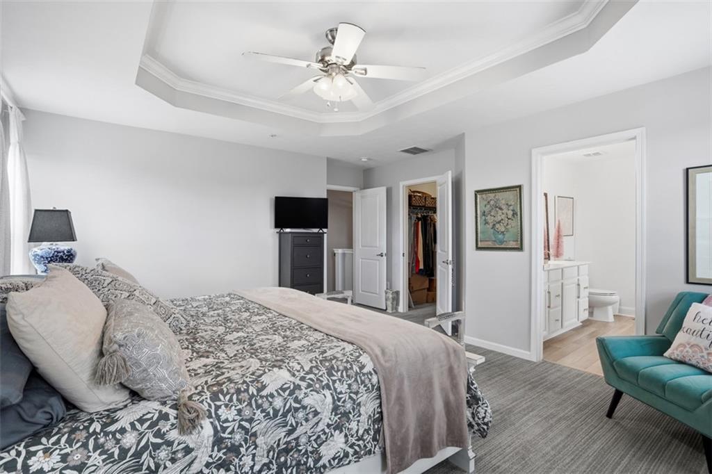 3101 Pointe View Drive Mars, PA 16046 - Photo 21 of 41 a bedroom with a large bed and a chandelier