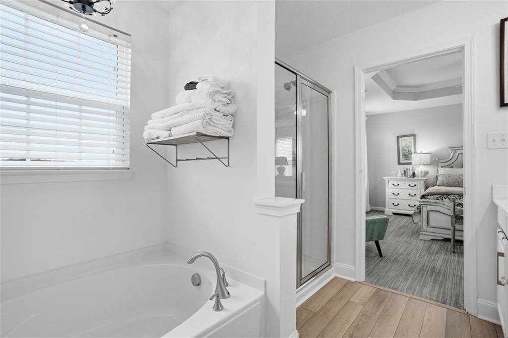 3101 Pointe View Drive Mars, PA 16046 - Photo 23 of 41 a bathroom with a bathtub and a shower