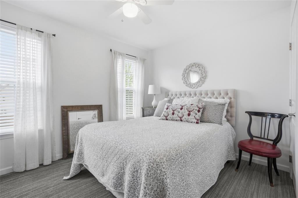 3101 Pointe View Drive Mars, PA 16046 - Photo 24 of 41 a bedroom with a bed and a chair with wooden floor