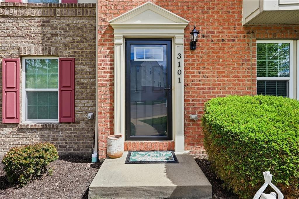 3101 Pointe View Drive Mars, PA 16046 - Photo 3 of 41 a view of a brick house with a large door