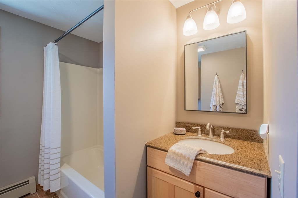 43 Potato Hill Road Westminster, MA 01473 - Photo 8 of 29 a bathroom with a sink and a mirror