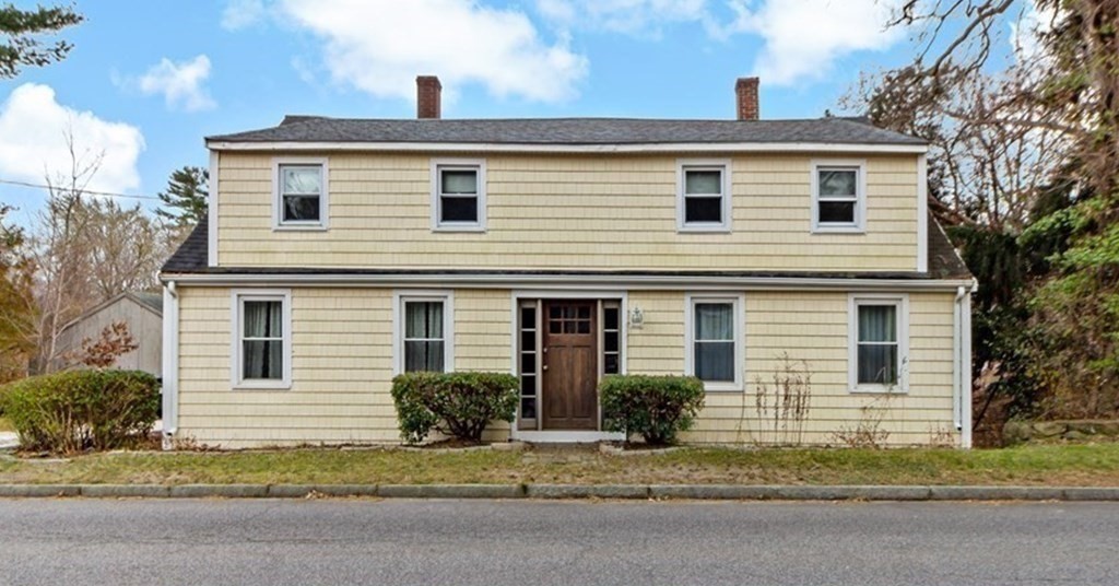 978 Point Road Marion, MA 02738 - Photo 3 of 38 a front view of a house with a yard