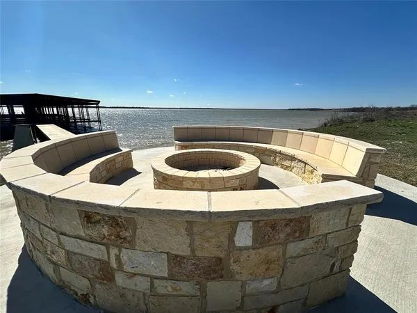a view of a street with a building in the background