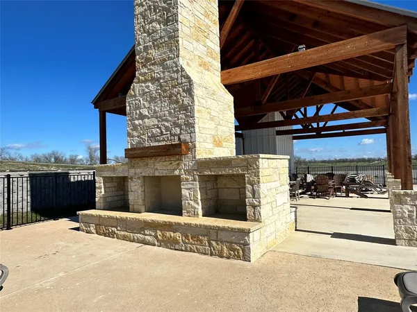 a view of a swimming pool and an outdoor space